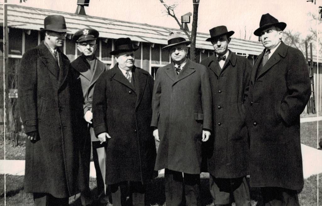 From left to right: D.B. Littrell, Major G.E. Cook, E.J. Lundin, Hon. H.L. Ickes, C.G. Sauers, H.W. Snell, Photo taken at National Park Service Headquarters, Camp Skokie Valley, Spril 3, 1938, on occasion of the celebration of the fifth anniversary of the Civilian Conservation Corps. WHS Object 1976.59.28 (© all rights reserved)