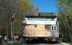 Log House being moved on May 6th 2003